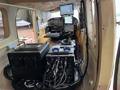Inside of surveying plane, showing equipment for the project