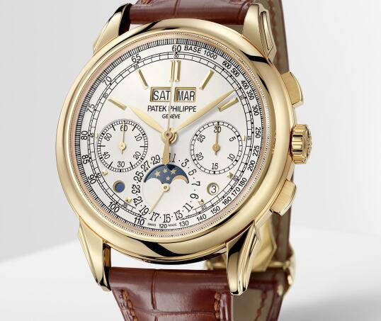 The gold hands and hour markers are contrasted to the white dial.